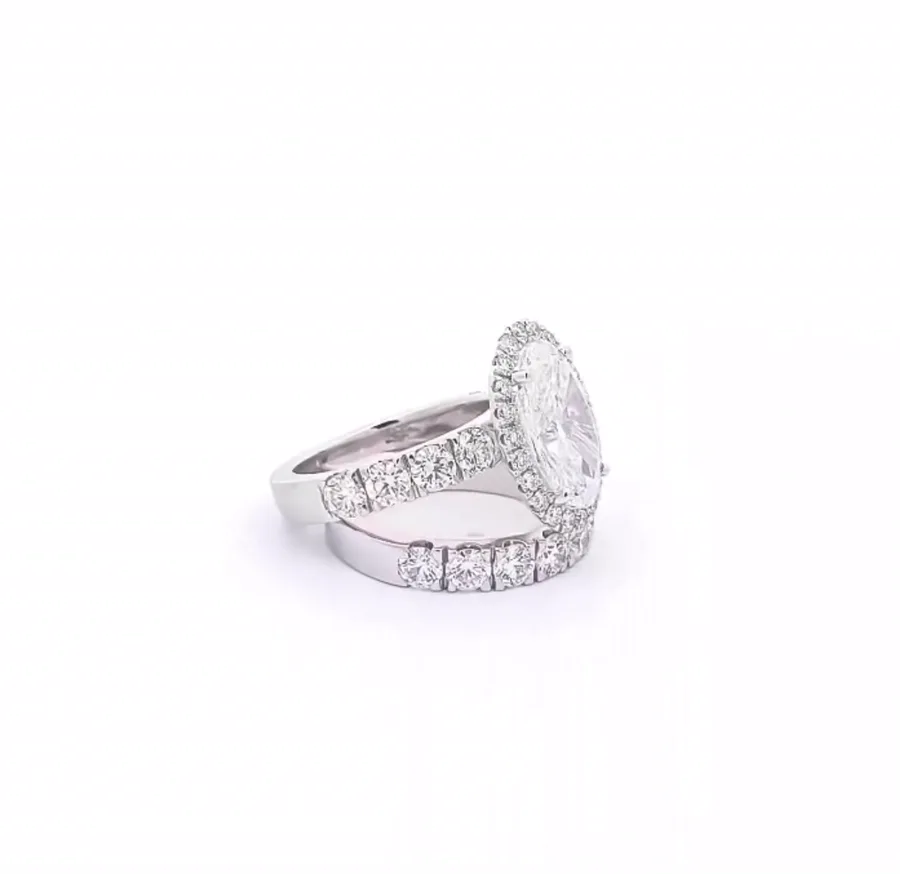 A custom diamond ring turning slowly to show its details