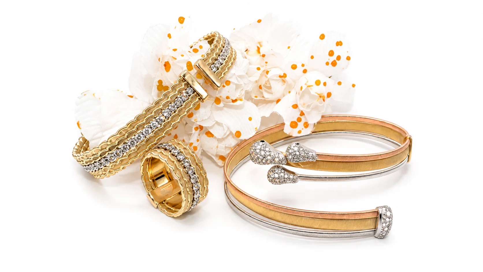 Yellow, white and rose gold bangles with diamond details
