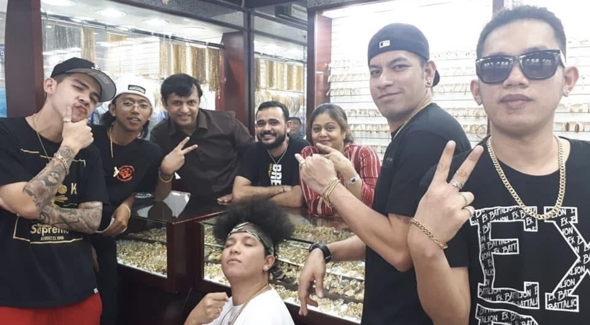 Customers and friends gathered with the Roza team inside the shop